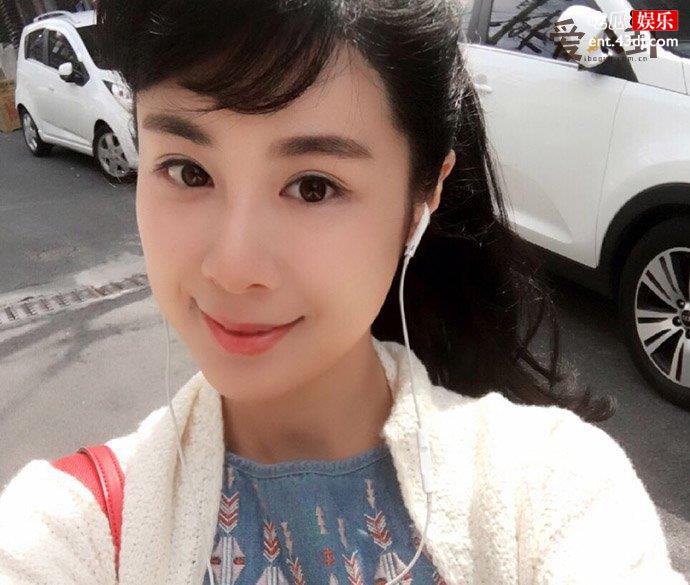 张力伊照片